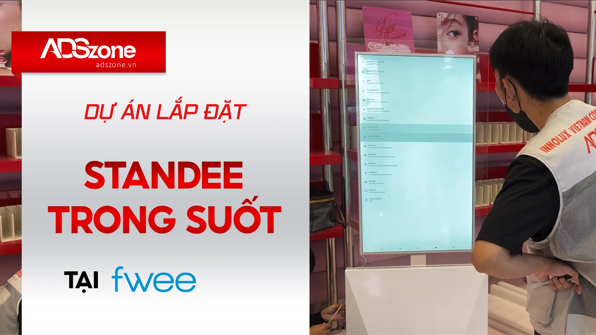 Lắp Đặt Màn Hình Chân Đứng Hai Mặt Trong Suốt Tại Fwee